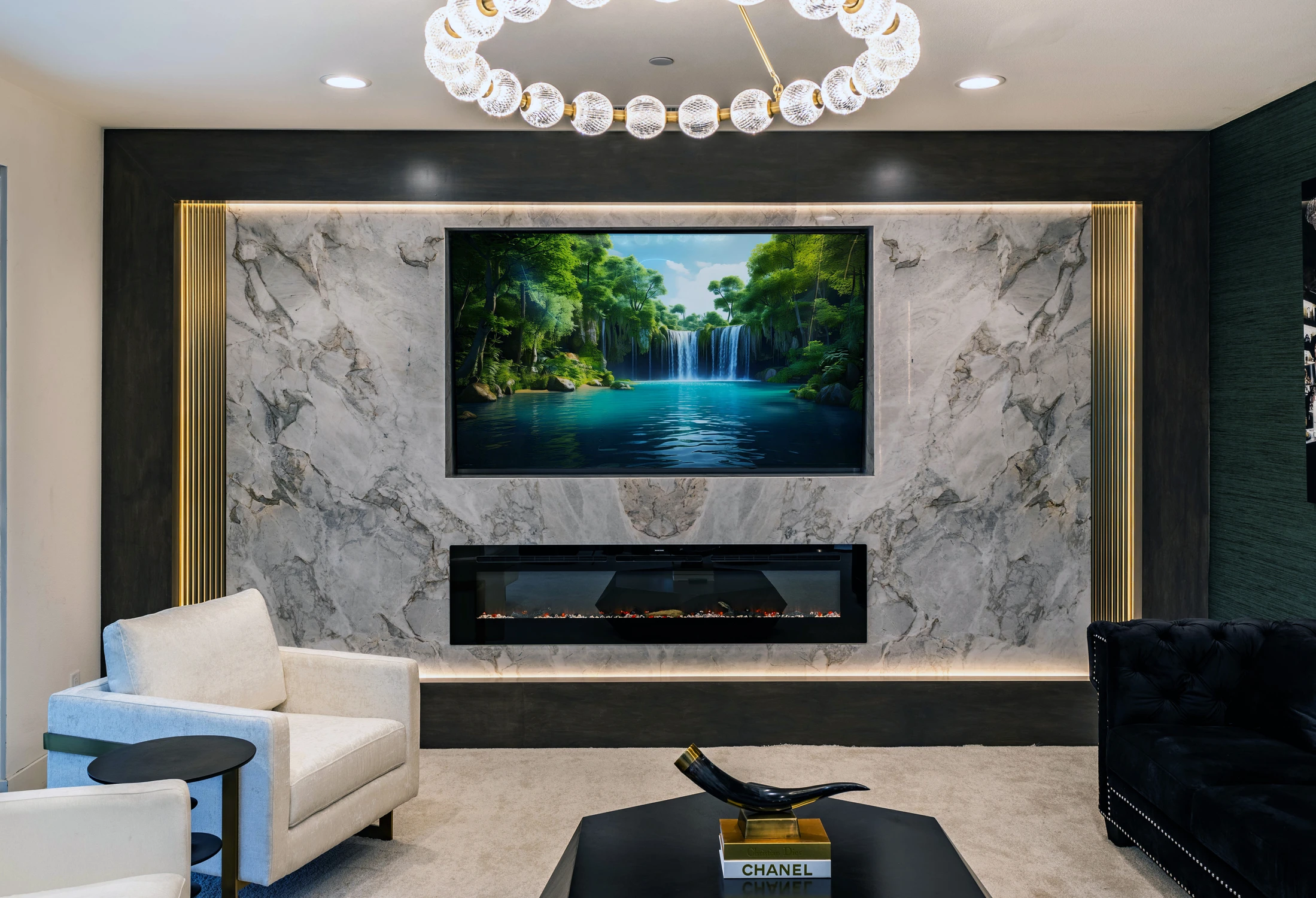 Upper-level sitting area with black railings and portrait artwork