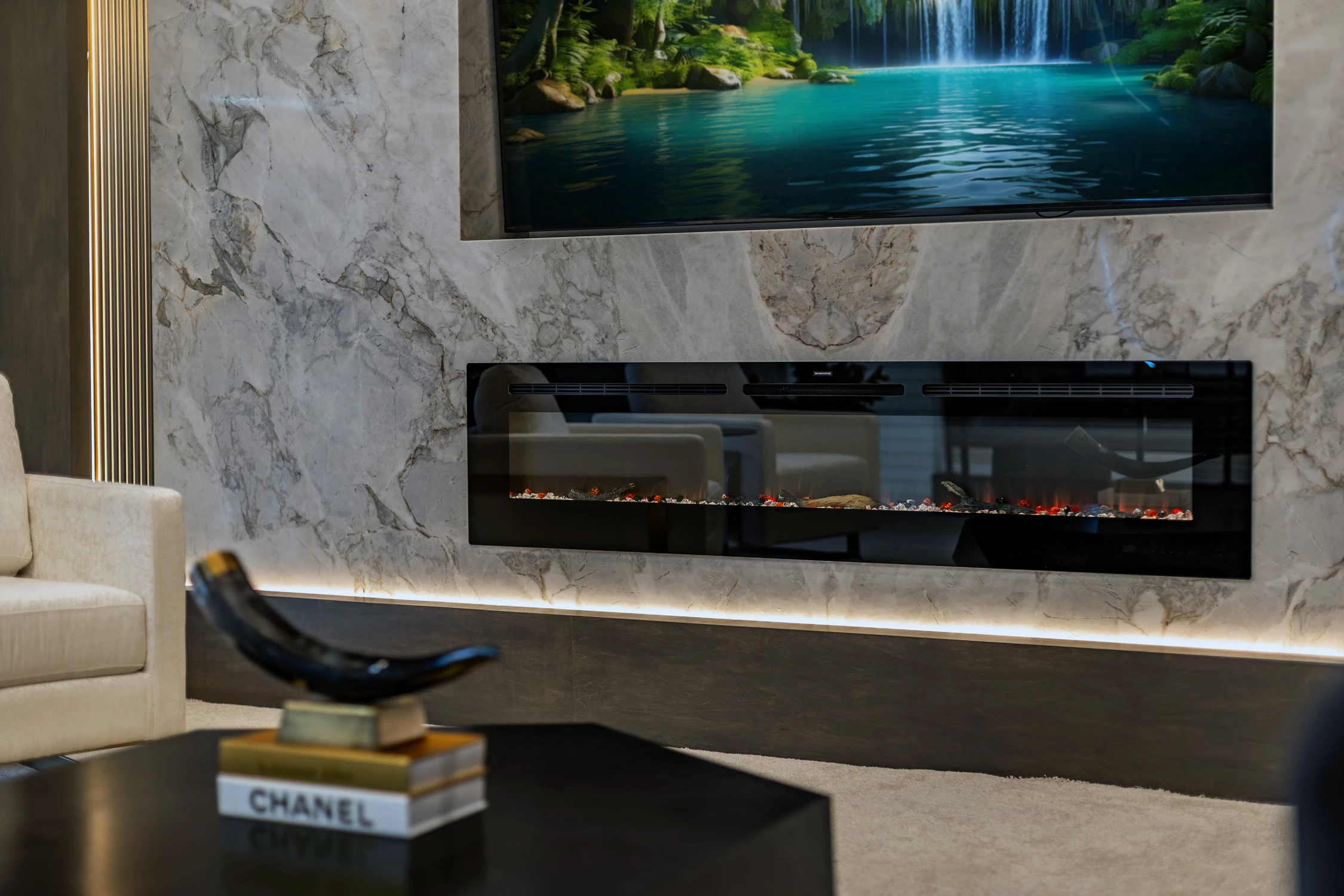 Close-up of marble fireplace with linear gas fire