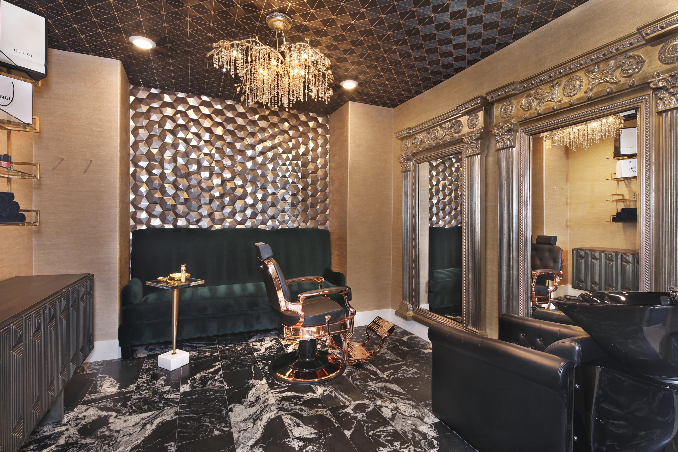 Private in-home hair salon with green banquette, black seating, and crystal chandelier