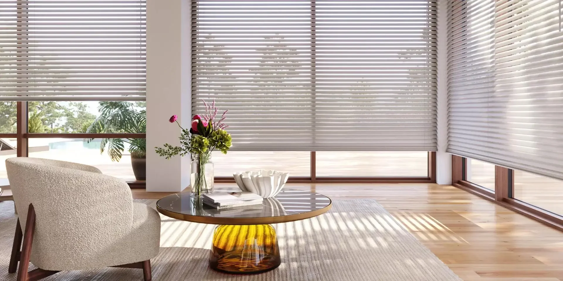 White horizontal blinds filtering sunlight in a modern living room