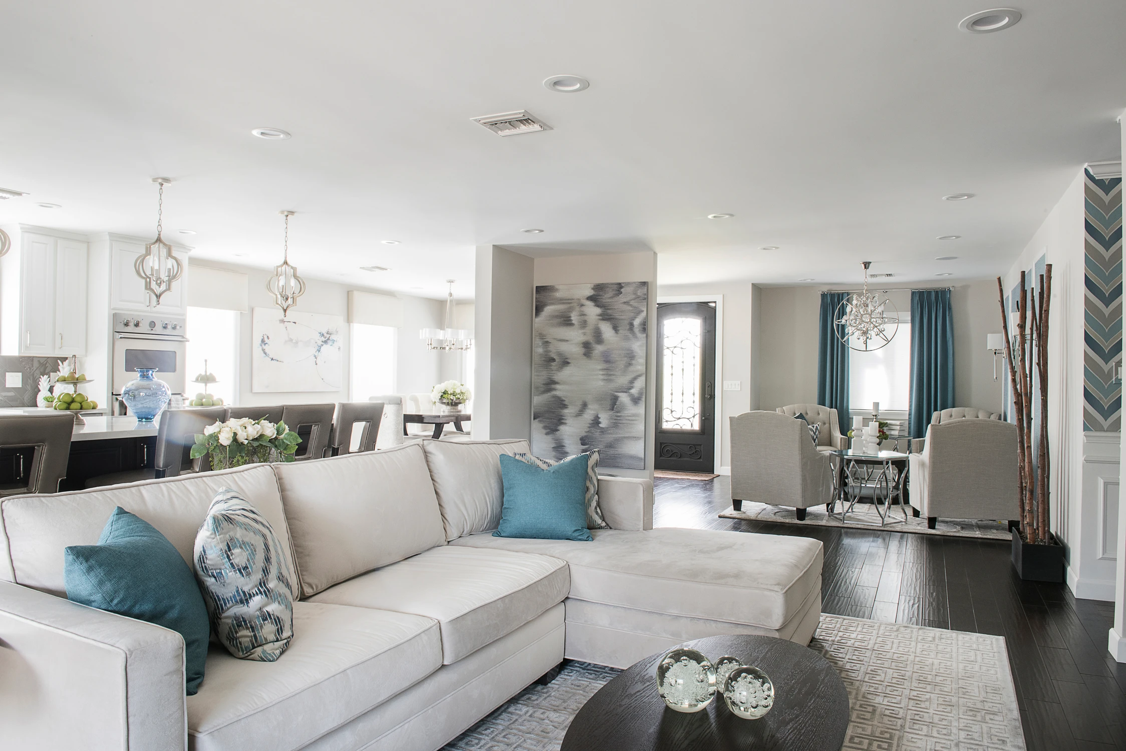 Open living room leading toward kitchen and dining areas
