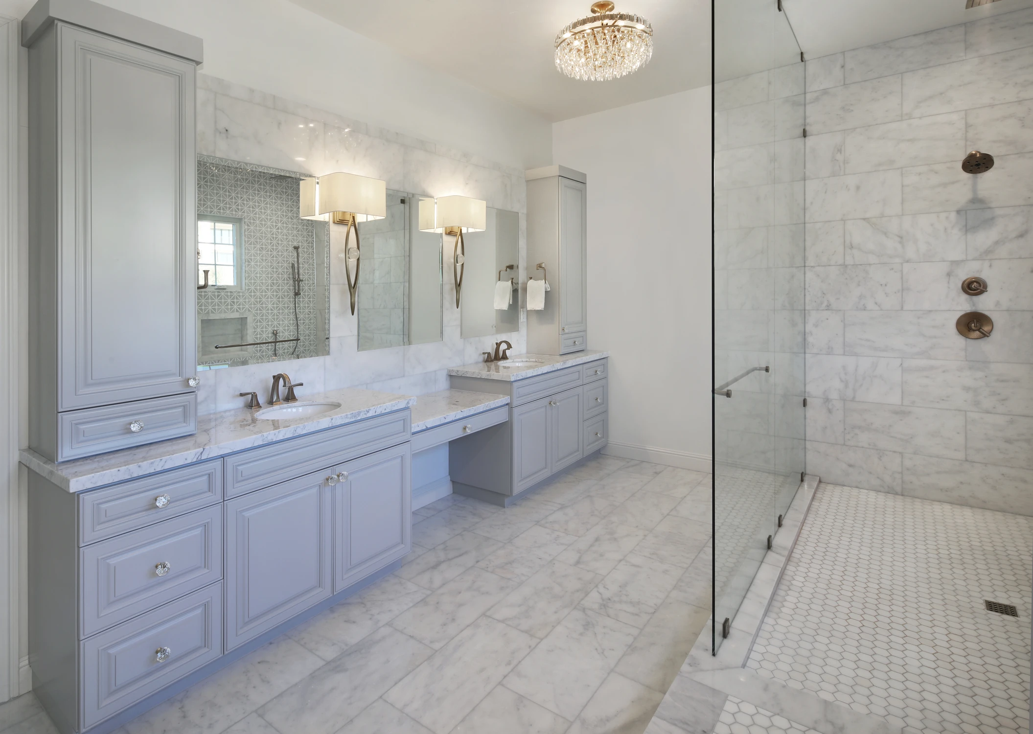 Master bathroom with double vanity and glass shower
